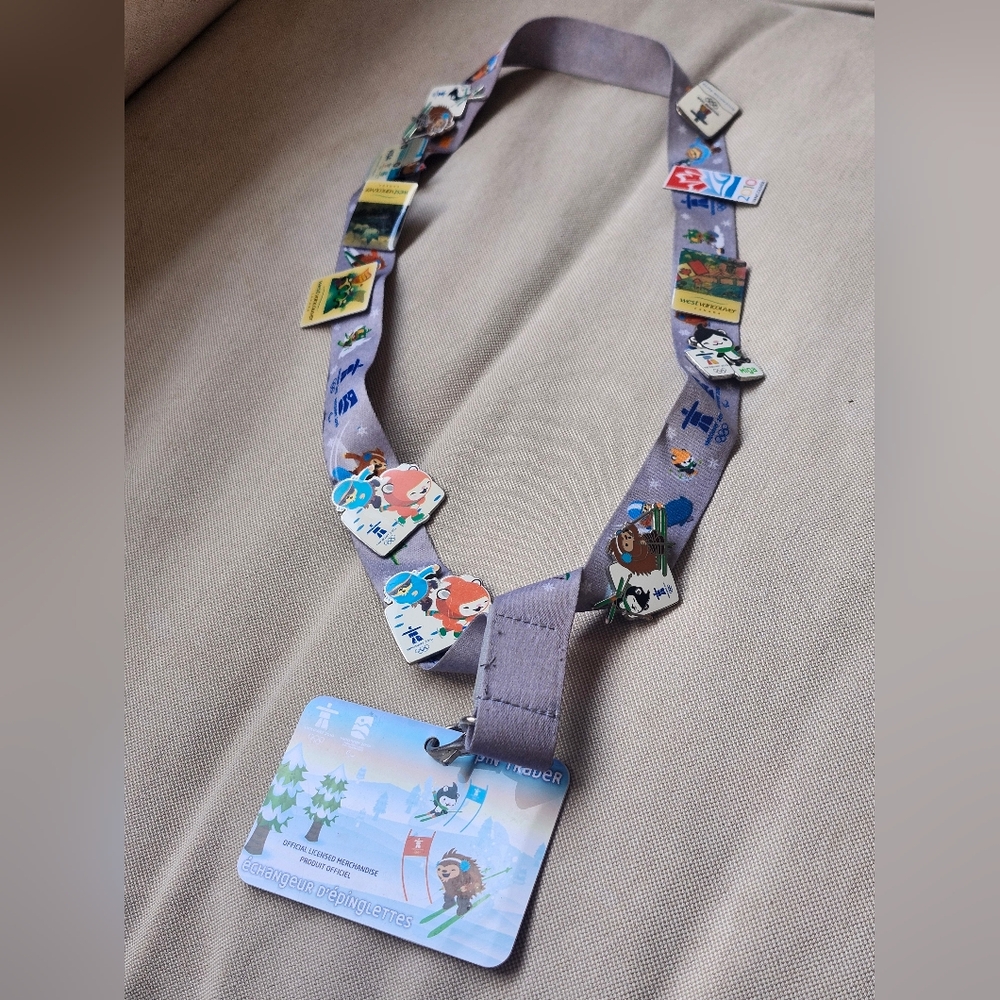 Olympic 2010 Gray Lanyard with Assorted Pins